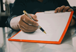 a photo of a contract waiting for signature