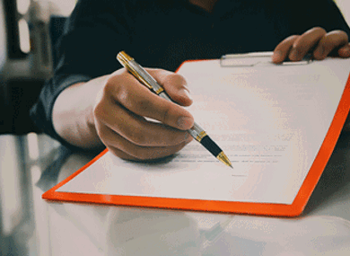 a photo of a contract waiting for signature
