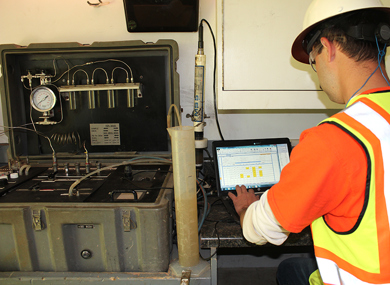 Pictured: Cascade Environmental employee monitoring injection remediation project